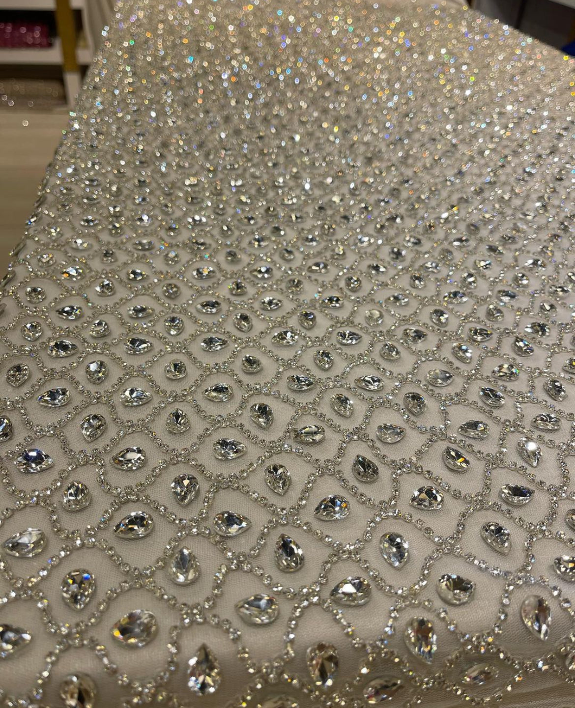 Radiant Hand-Embroidered Geometric Fabric β Iridescent Elegance