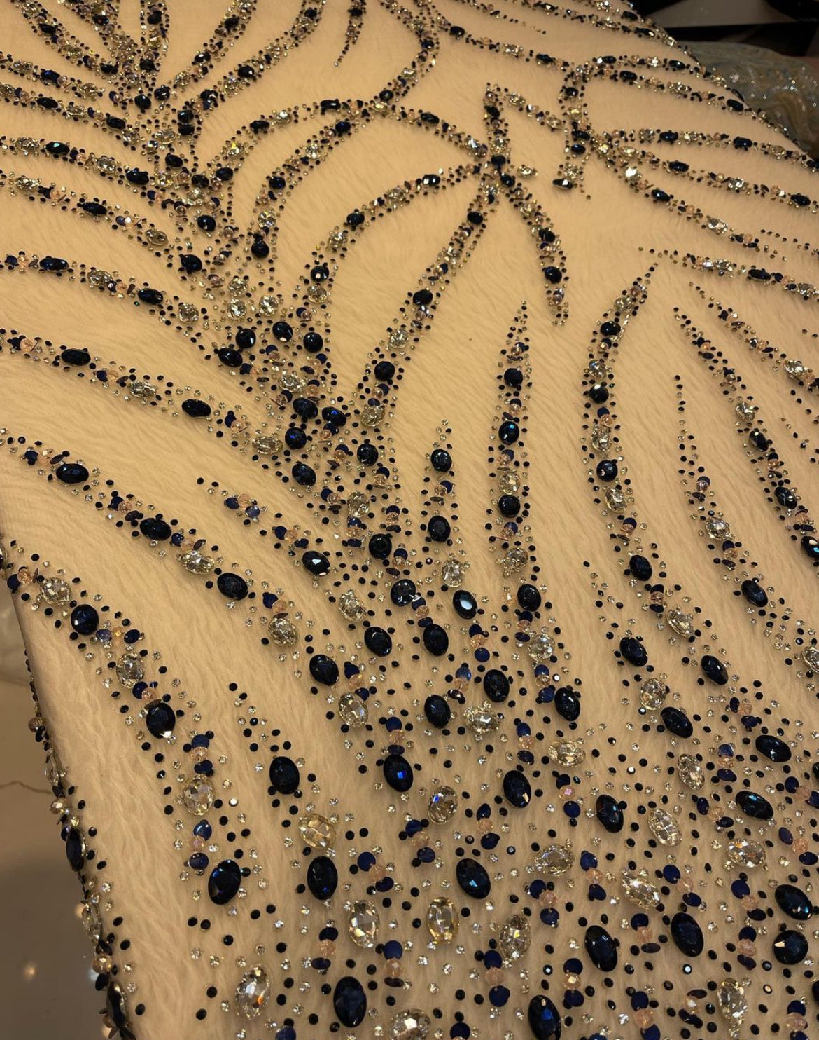 Elegant Hand-Embroidered Pastel Green and Navy Blue Fabrics with Shimmering Detailing