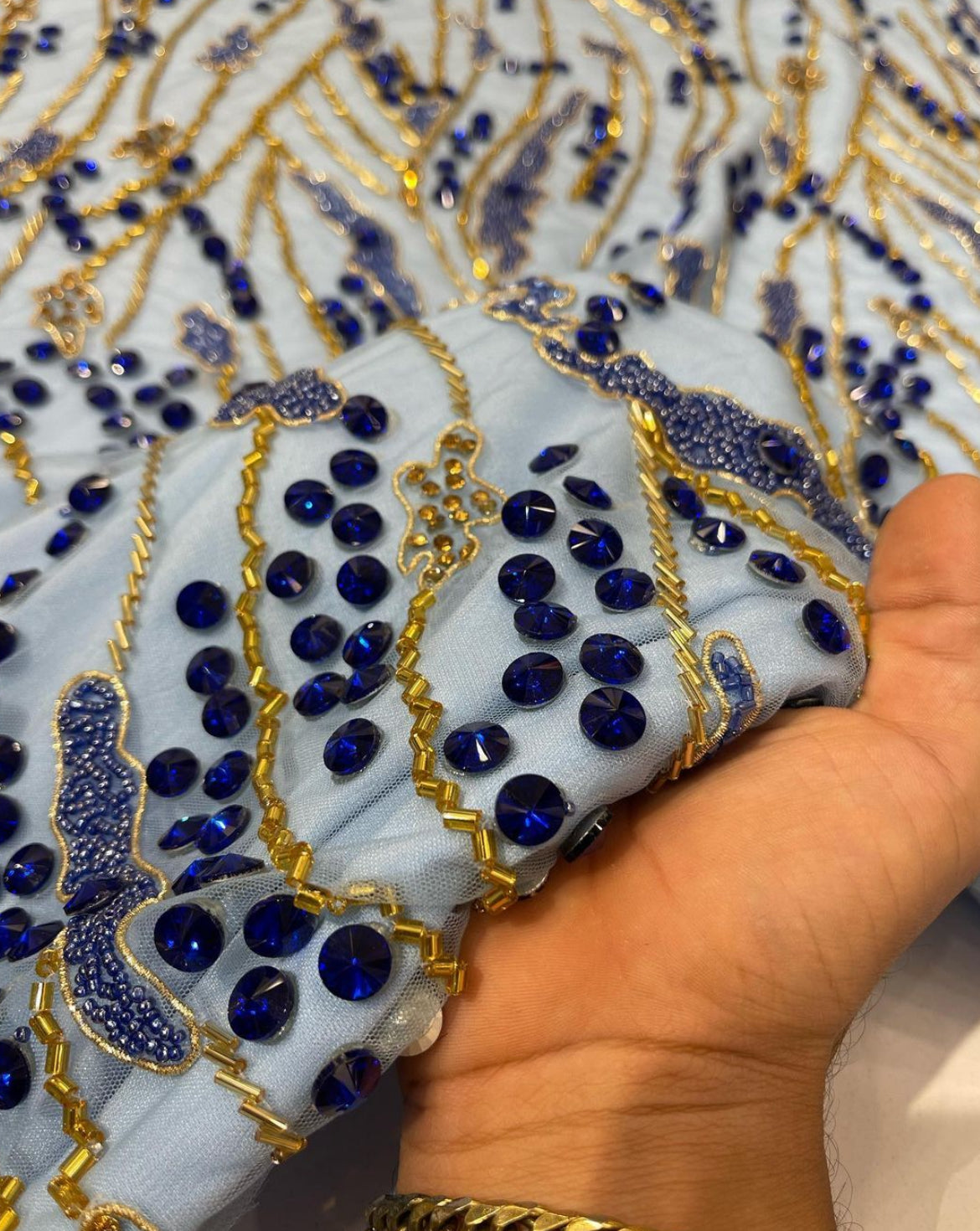 Luxurious Handcrafted Embroidered Fabric – Dynamic Gold & Blue Design with Silver & Purple Options