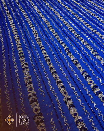 Ethereal Blue Symphony: Hand-Embroidered Tulle Fabric in Bold Color Variations